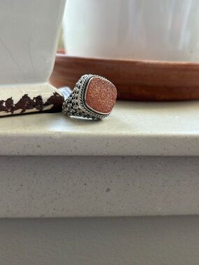 Silver Filigree Ring with Sparkling Peach Stone